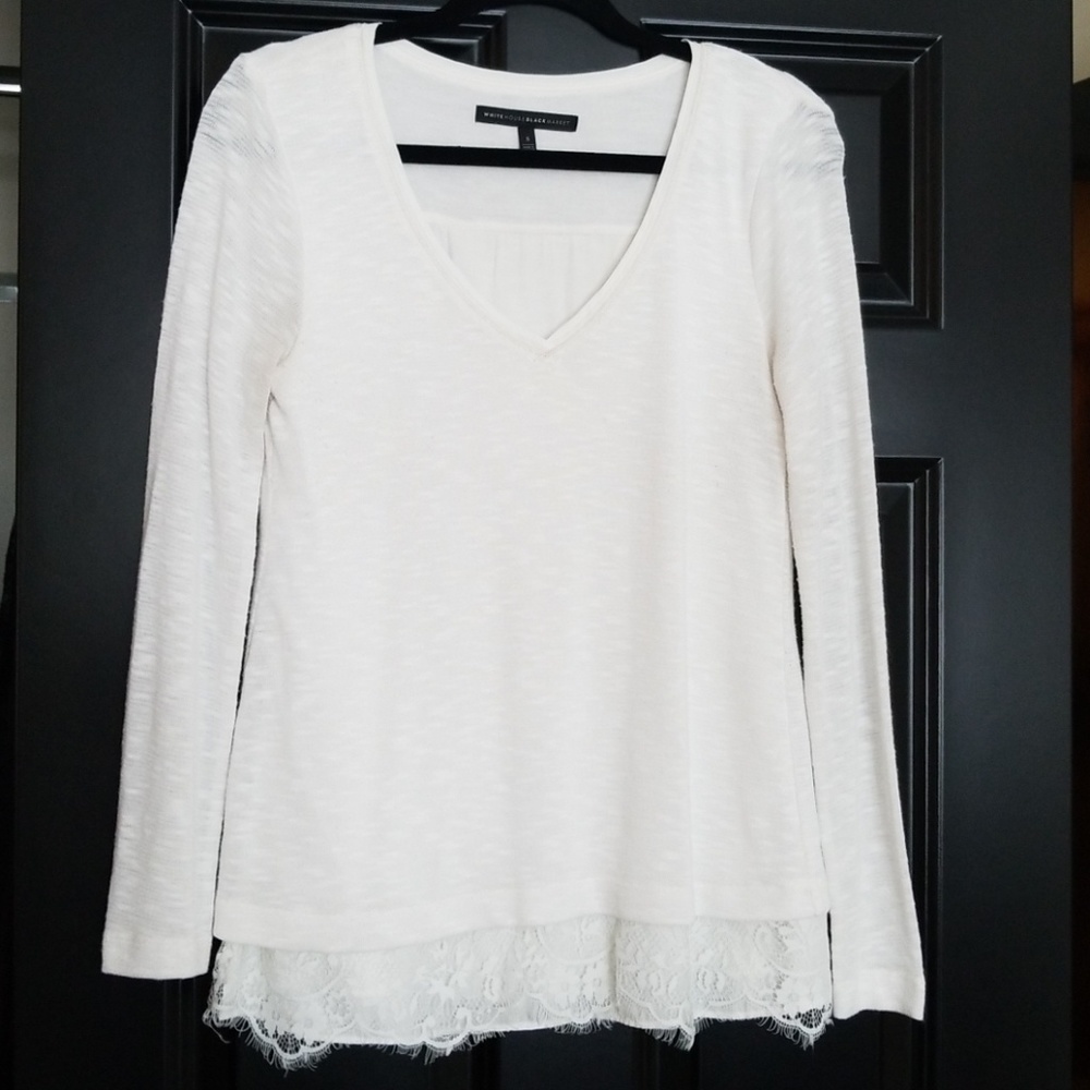 Whbm white knit top with lace details.